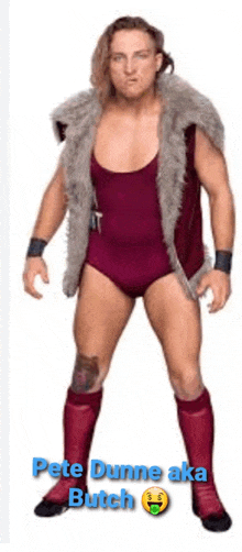 a man in a wrestling outfit with the name pete dunne aka butch