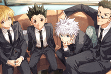 a group of anime characters sitting on a couch