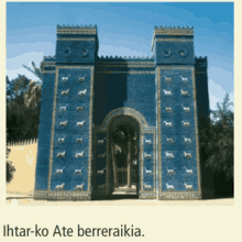 a picture of an ancient building with the words ihar-ko ate berreraikia below it