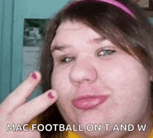 a woman making a face with the words mac football on t and w