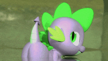 spike from my little pony has a green leaf on its head