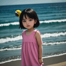 a little girl with a parrot on her head