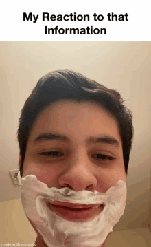 a man with shaving foam on his face with the caption my reaction to that information made with mematic