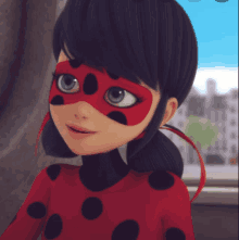 a ladybug cartoon character wearing a red and black polka dot outfit