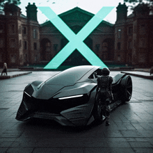 a futuristic car is parked in front of a building with an x on it