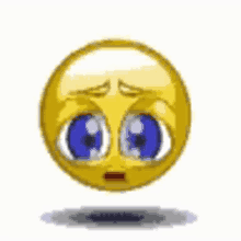 a yellow smiley face with blue eyes is floating in the air on a white background .