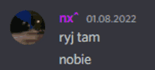 a blurred image of a person 's face with the words nx 01 08.2022 ryj tam sobie below it