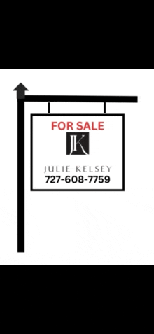 a for sale sign for julie kelsey is shown