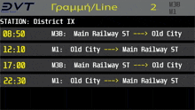 a digital display shows the time and location of a station