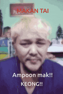 a picture of a man with a caption that says makan tai ampoon mak keong