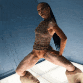 a woman with long black hair is wearing a very revealing outfit