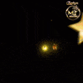 a sign that says thank you macham with stars flying around it