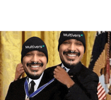 two men wearing beanies that say multivers