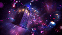 a police box is flying through a galaxy in space