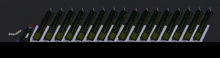 a row of green bottles are lined up in a row on a dark background