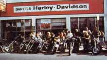 a harley davidson store with motorcycles parked outside