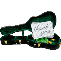 a guitar case with a thank you note on top