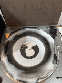 a record is being played on a turntable with a label that says ' the rolling stones '