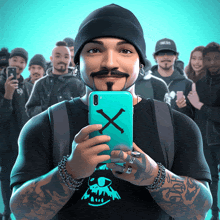 a man holding a phone with an x on the back