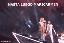 a woman is dancing on a stage with the words hasta luego maricarmen written above her