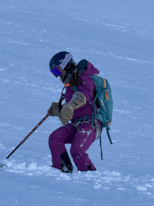 a person wearing a helmet and goggles with the word scott on them