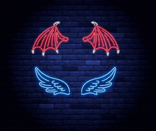 a neon sign of a devil 's wings and an angel 's wings on a brick wall