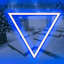 a blue triangle with a yellow border is surrounded by snow