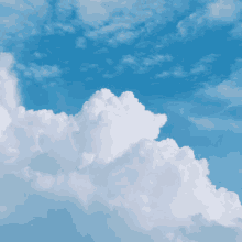 a blue sky with white clouds and a single cloud in the middle