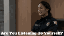 a woman in a police uniform is smiling with the words " are you listening to yourself " above her