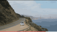 a white car is driving down a road next to the water