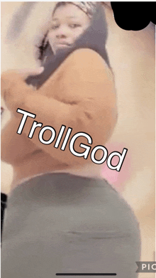 a picture of a woman with a caption that says trollgod