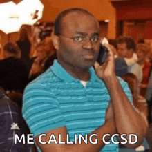 a man talking on a cell phone with the words me calling ccsd written below him