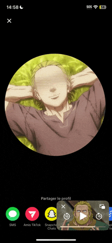 a phone screen shows a picture of a man in a circle with his hands behind his head