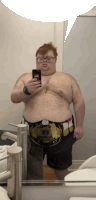 a man taking a picture of himself with a belt that says intercontinental heavyweight champion