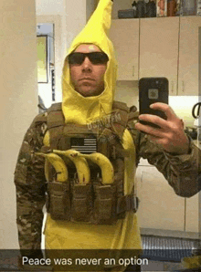 a man in a banana suit is taking a selfie with a phone .