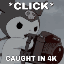 a picture of a cartoon character holding a camera that says " click "