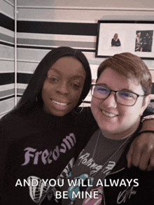 two women posing for a picture with the words " and you will always be mine "