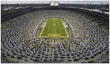 the green bay packers stadium is filled with fans