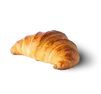 a croissant is sitting on a white surface