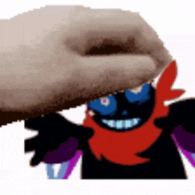 a hand is holding a cartoon character with a red scarf around his neck
