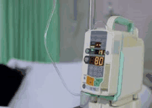 a hospital bed with a drip attached to it .