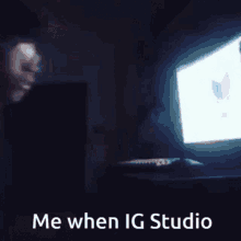 a person pointing at a computer screen with the words me when ig studio on the bottom