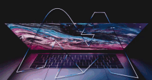 a laptop with a purple and blue swirl on it