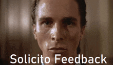 a close up of a man 's face with the words solicito feedback above it