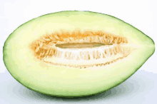 a half of a melon with a hole in the middle