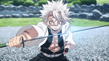 a white haired anime character holding a sword