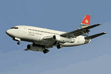 a south african airlines plane is flying in the air