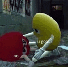 a yellow m&m is standing next to a red m&m and asking if u good .