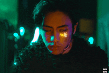 a close up of a person 's face with the words dpr gifs above it