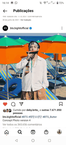 a picture of a person eating a watermelon on a beach